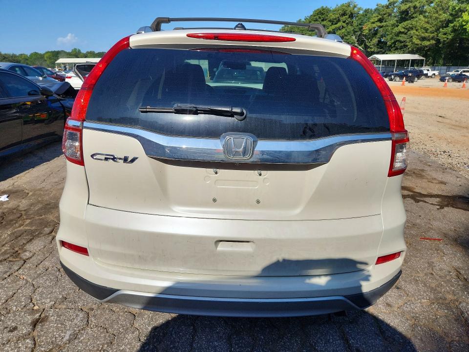 Photo 6 from auction – 2015 HONDA CR-V with VIN 5J6RM3H79FL010381