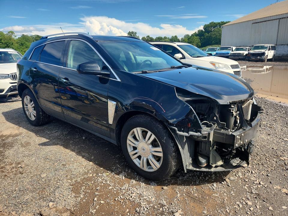 Photo 4 from auction – 2016 CADILLAC SRX with VIN 3GYFNEE36GS577947