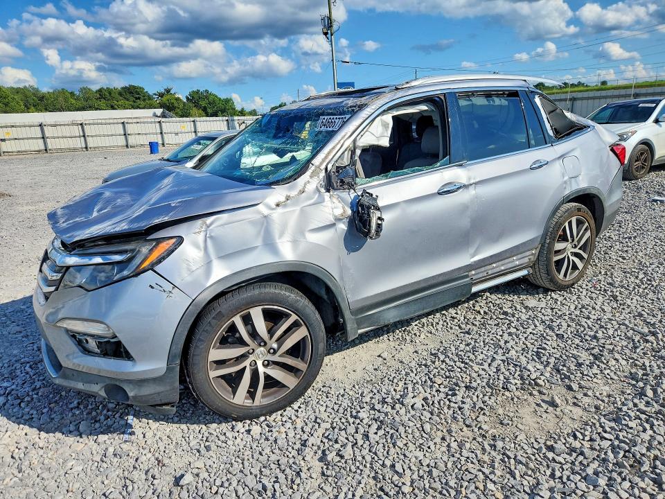 HONDA PILOT 2017 с VIN 5FNYF5H97HB023354 - Фото с аукциона