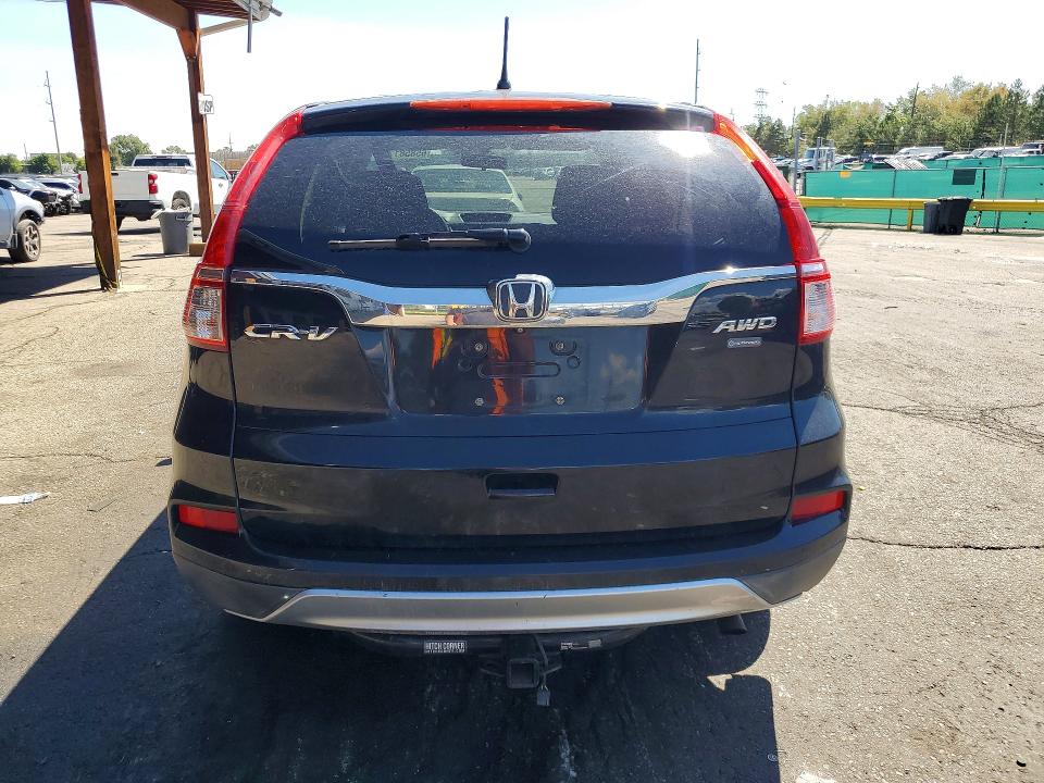 Photo 6 from auction – 2015 HONDA CR-V with VIN 2HKRM4H5XFH643955