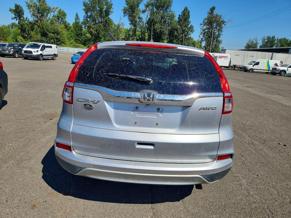 Photo 6 from auction – 2016 HONDA CR-V with VIN 2HKRM4H57GH669771