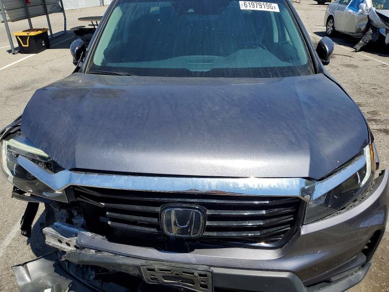 Photo 11 from auction – 2023 HONDA RIDGELINE with VIN 5FPYK3F75PB056232