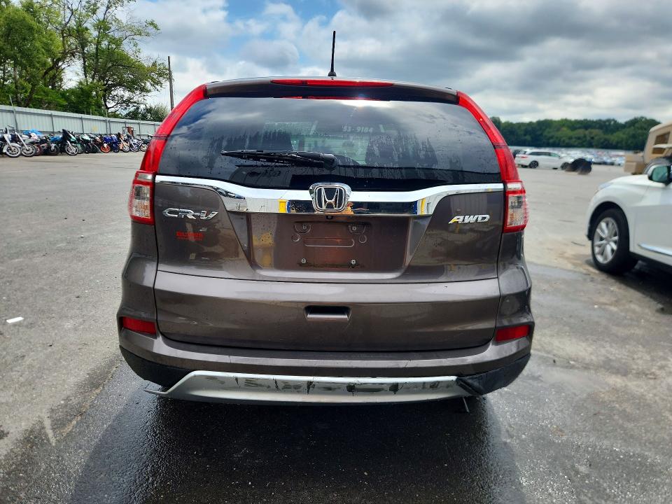 Photo 6 from auction – 2016 HONDA CR-V with VIN 2HKRM4H56GH688019