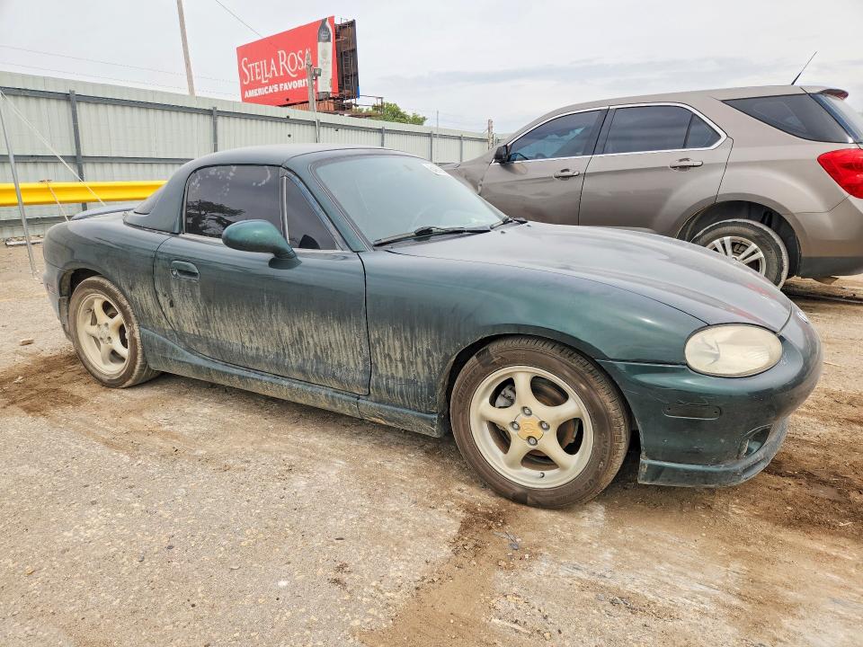 Photo 4 from auction – 1999 MAZDA MX-5 MIATA with VIN JM1NB3534X0121032