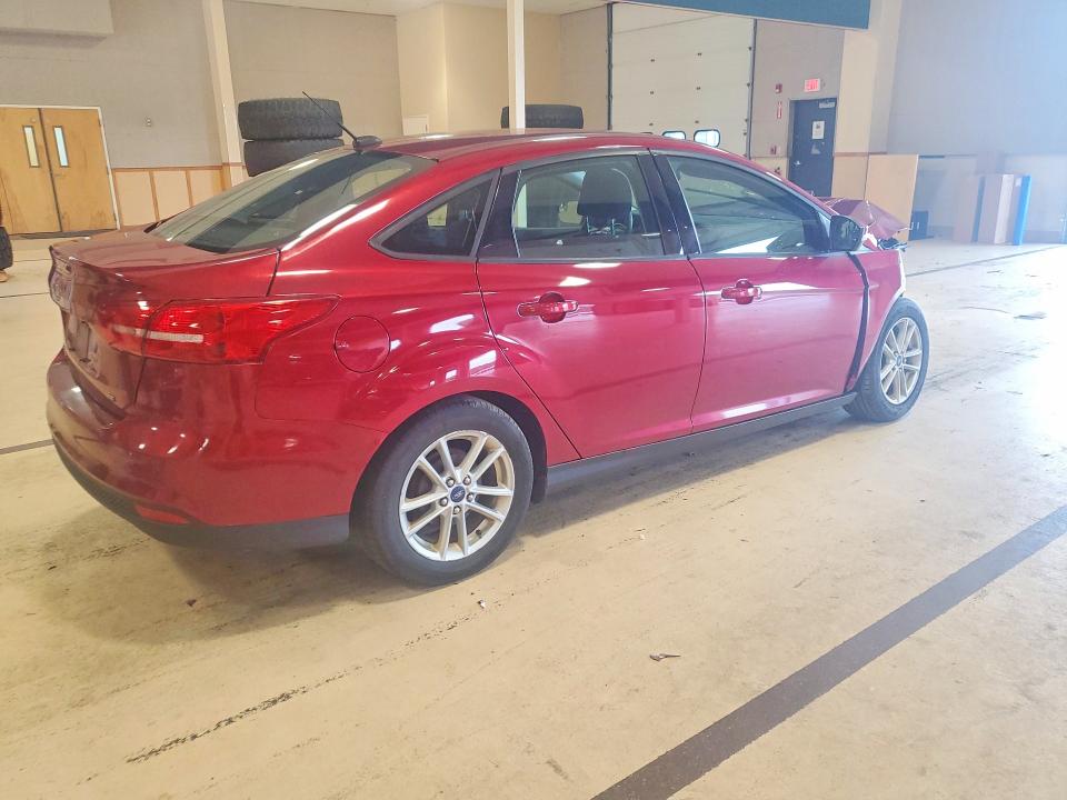 Photo 3 from auction – 2016 FORD FOCUS with VIN 1FADP3F29GL206696