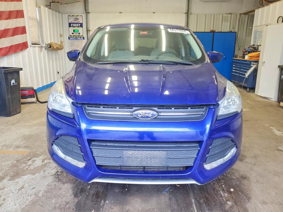 Photo 5 from auction – 2016 FORD ESCAPE with VIN 1FMCU9G90GUA57405