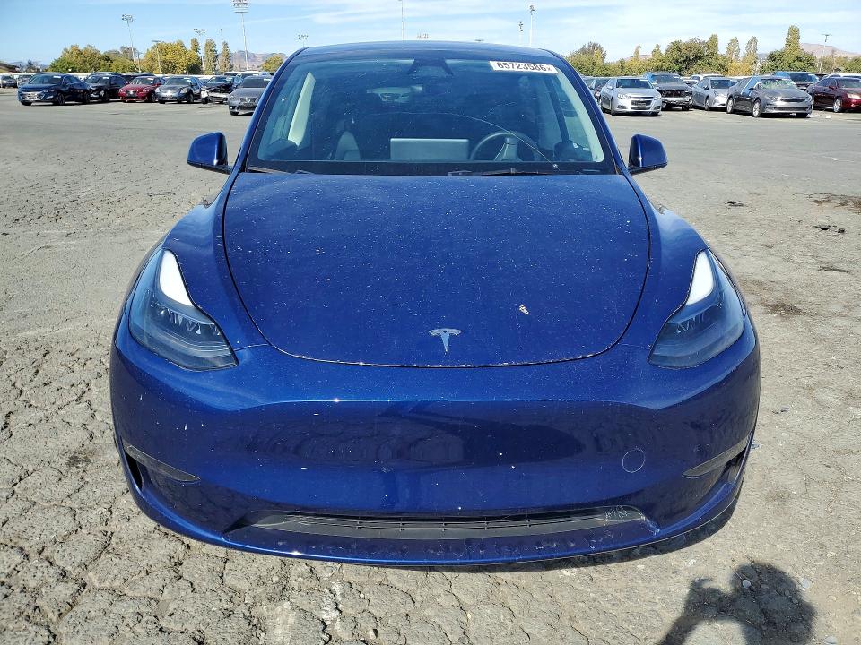 Photo 5 from auction – 2023 TESLA MODEL Y with VIN 7SAYGDED8PF950056