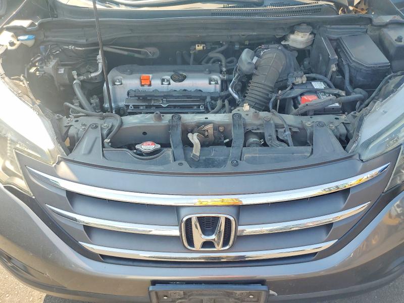 Photo 11 from auction – 2014 HONDA CR-V with VIN 2HKRM4H76EH667430