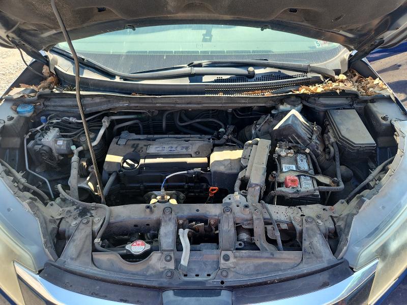 Photo 12 from auction – 2015 HONDA CR-V with VIN 2HKRM4H73FH655995