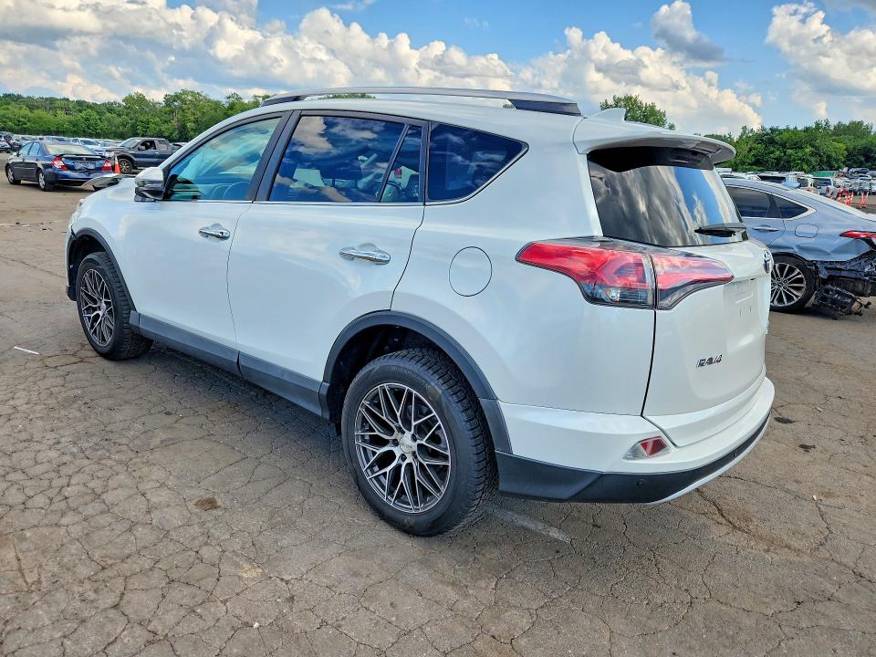 Photo 2 from auction – 2016 TOYOTA RAV4 with VIN 2T3DFREV0GW521024