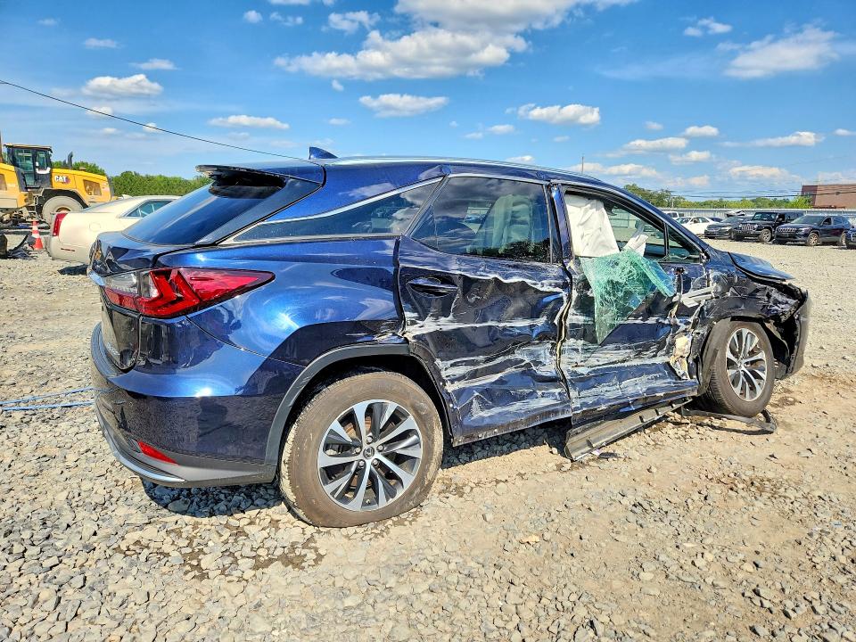 Photo 3 from auction – 2022 LEXUS RX with VIN 2T2HGMDA7NC077109