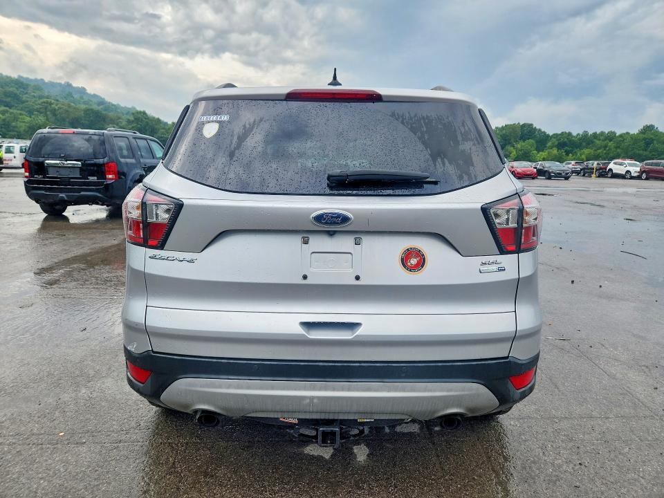 Photo 6 from auction – 2018 FORD ESCAPE with VIN 1FMCU9HD4JUD01681