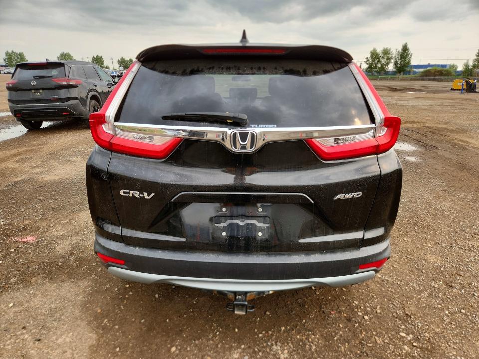Photo 6 from auction – 2018 HONDA CR-V with VIN 2HKRW2H27JH143930