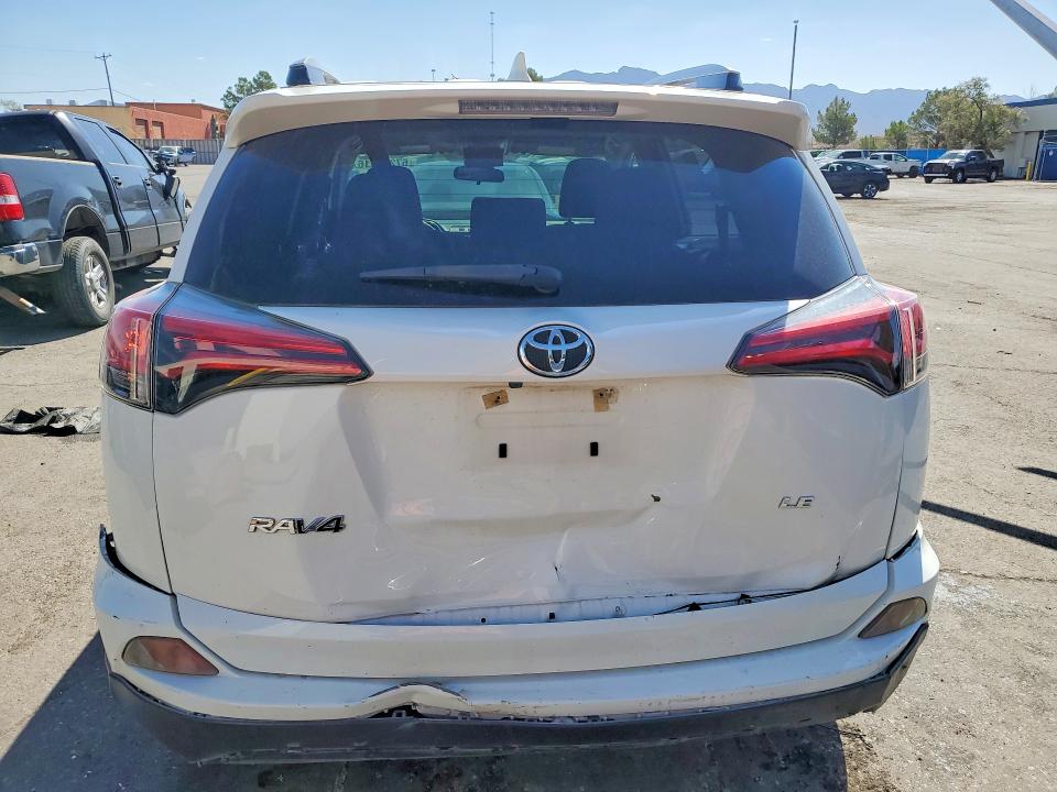 Photo 6 from auction – 2018 TOYOTA RAV4 with VIN JTMZFREV8JJ183125
