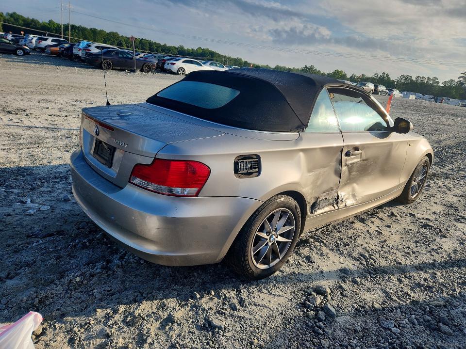Photo 3 from auction – 2011 BMW 128 with VIN WBAUL7C55BVM79334