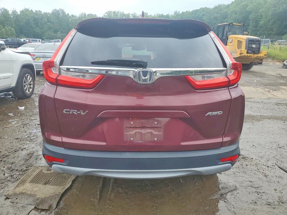 Photo 6 from auction – 2018 HONDA CR-V with VIN 2HKRW2H81JH636426