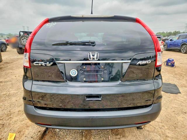 Photo 6 from auction – 2013 HONDA CR-V with VIN 2HKRM4H53DH679631