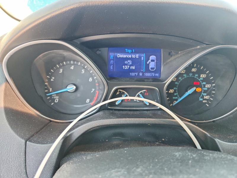 Photo 9 from auction – 2013 FORD FOCUS with VIN 1FADP3F22DL104796