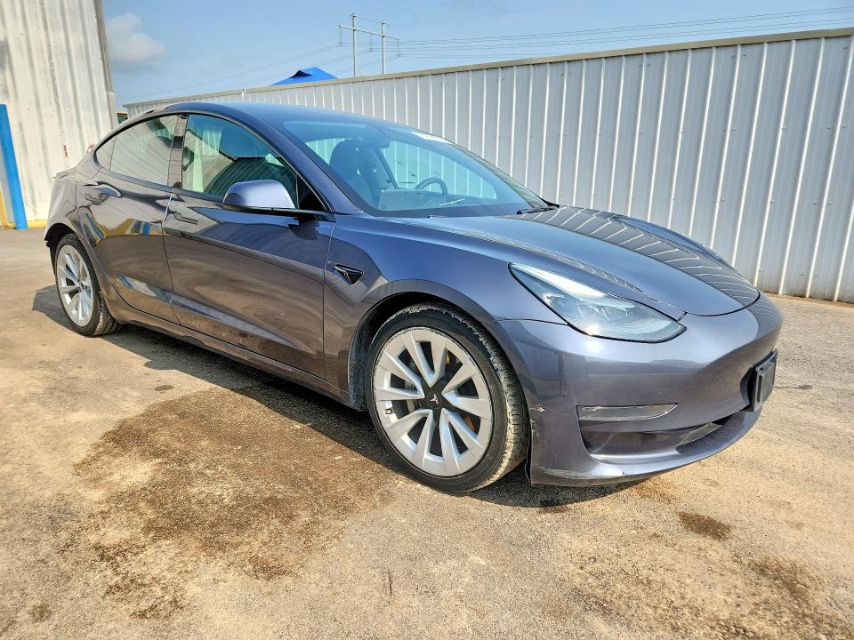 Photo 4 from auction – 2023 TESLA MODEL 3 with VIN 5YJ3E1EAXPF446710