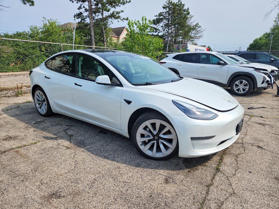 Photo 4 from auction – 2022 TESLA MODEL 3 with VIN 5YJ3E1EA4NF190531