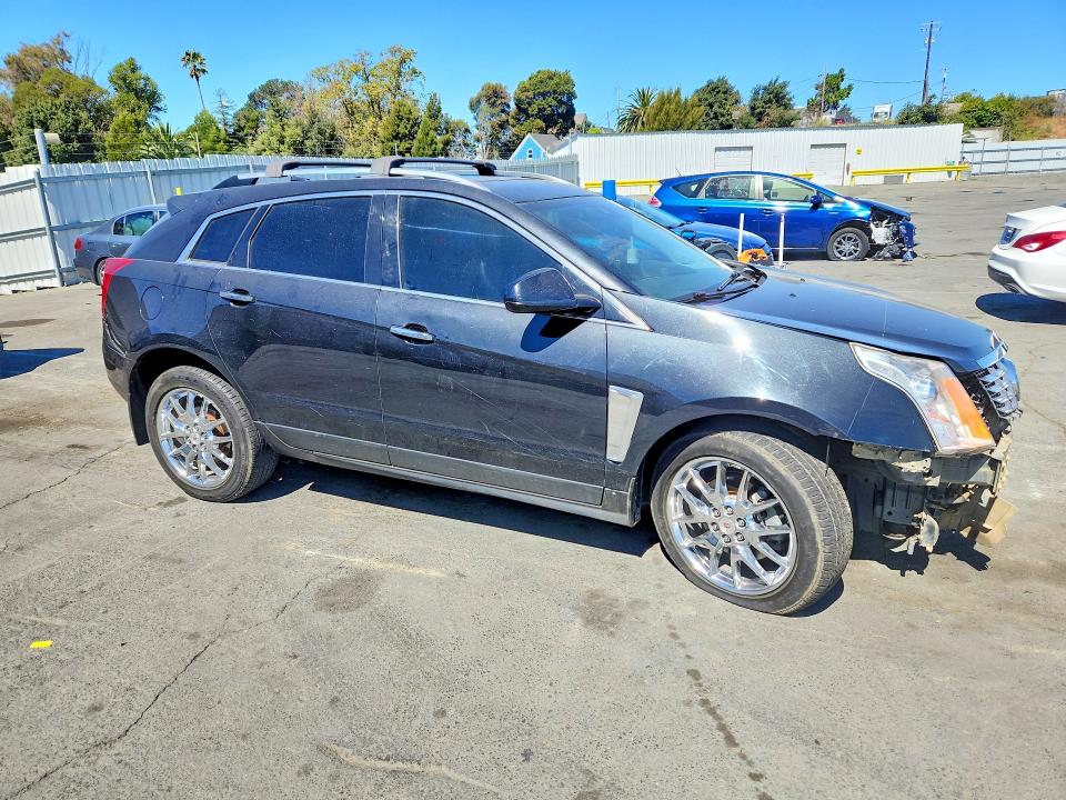 Photo 4 from auction – 2013 CADILLAC SRX with VIN 3GYFNJE31DS568643