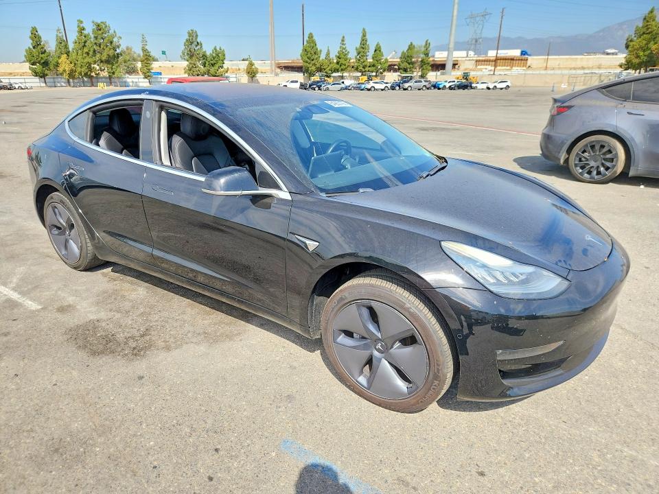 Снимка 4 от търг – 2019 TESLA MODEL 3 с VIN 5YJ3E1EA0KF297233