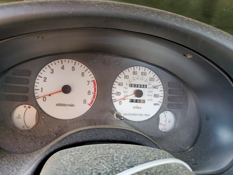Photo 9 from auction – 1999 MITSUBISHI ECLIPSE with VIN 4A3AK44Y4XE128967