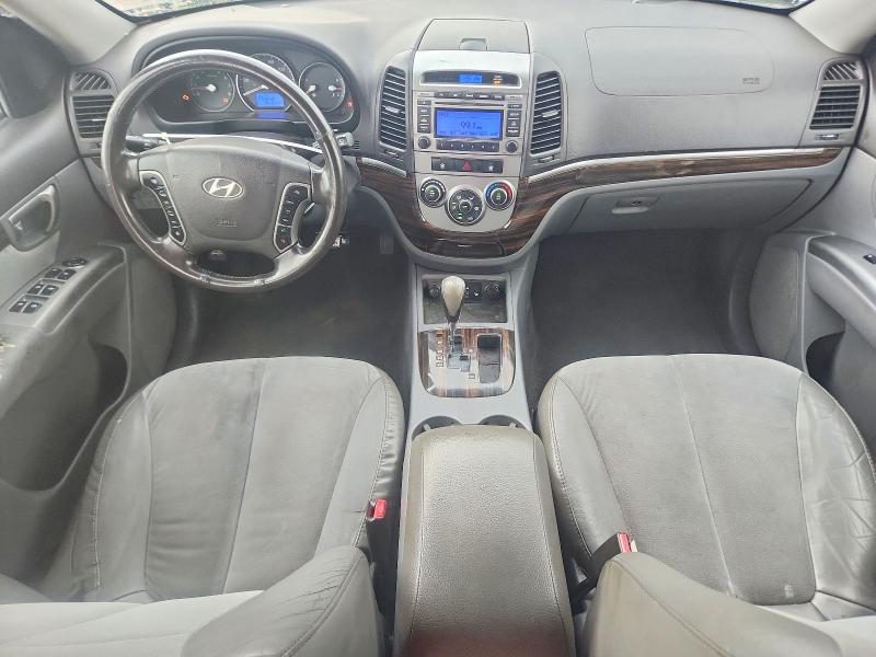 Photo 8 from auction – 2012 HYUNDAI SANTA FE with VIN 5XYZHDAG4CG139534