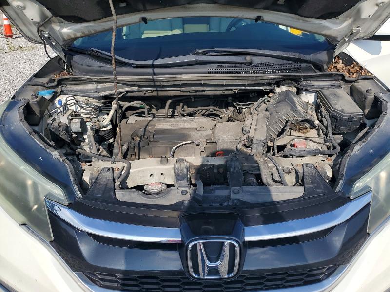 Photo 12 from auction – 2015 HONDA CR-V with VIN 5J6RM4H72FL003486