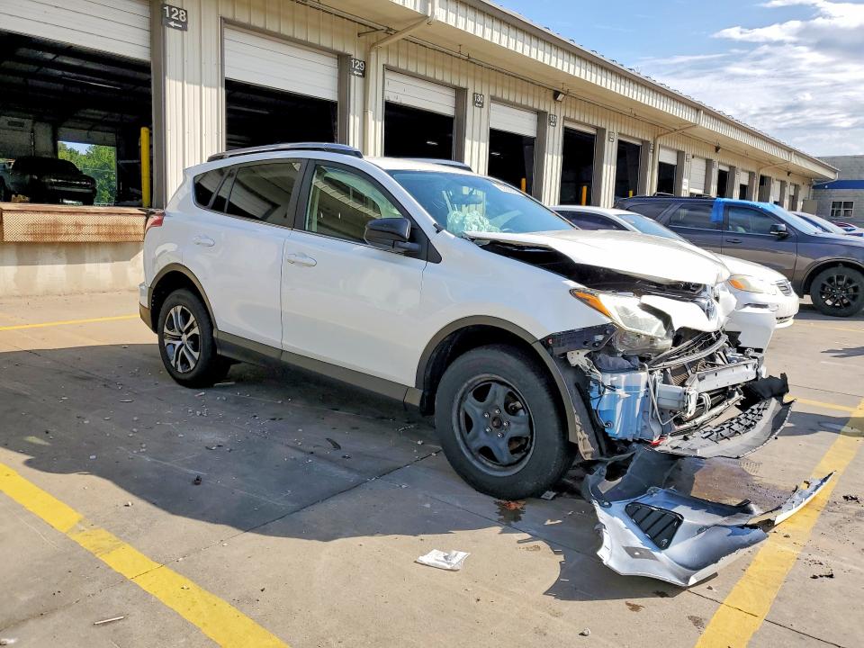 Photo 4 from auction – 2016 TOYOTA RAV4 with VIN JTMZFREV7GJ082814