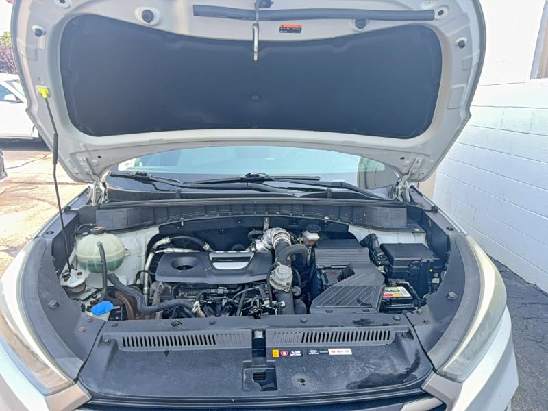 Photo 7 from auction – 2016 HYUNDAI TUCSON with VIN KM8J3CA29GU192143