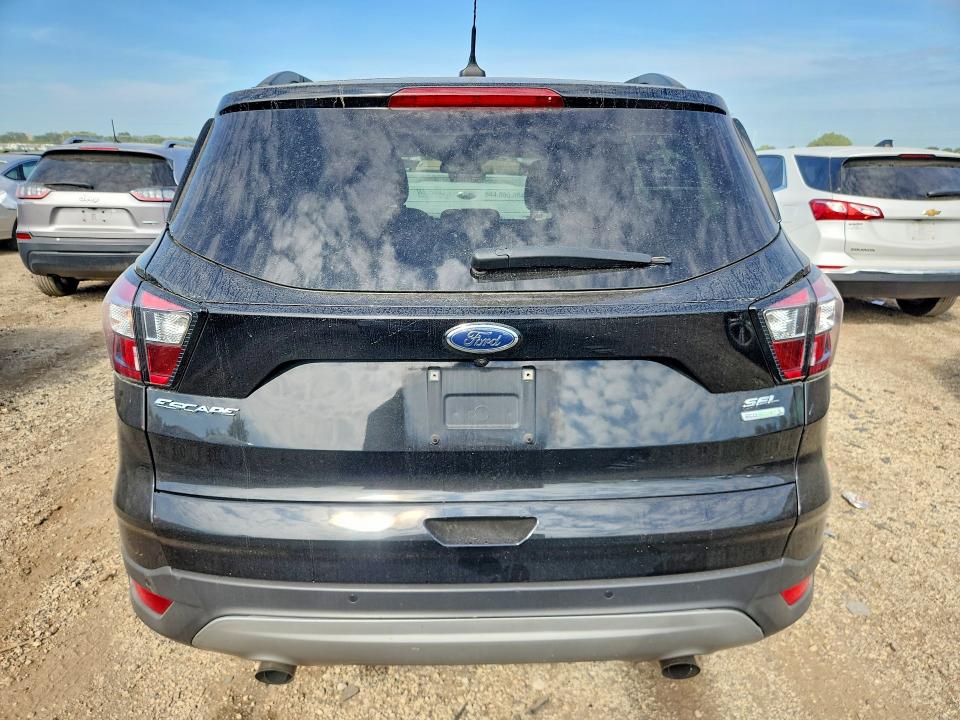 صورة رقم 6 من المزاد - 2018 FORD ESCAPE مع VIN 1FMCU0HDXJUB99590