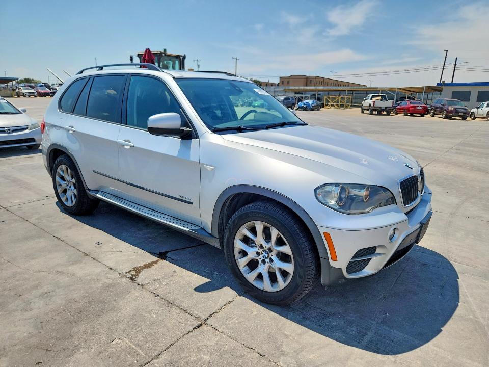 Photo 4 from auction – 2011 BMW X5 with VIN 5UXZV4C55BL414074