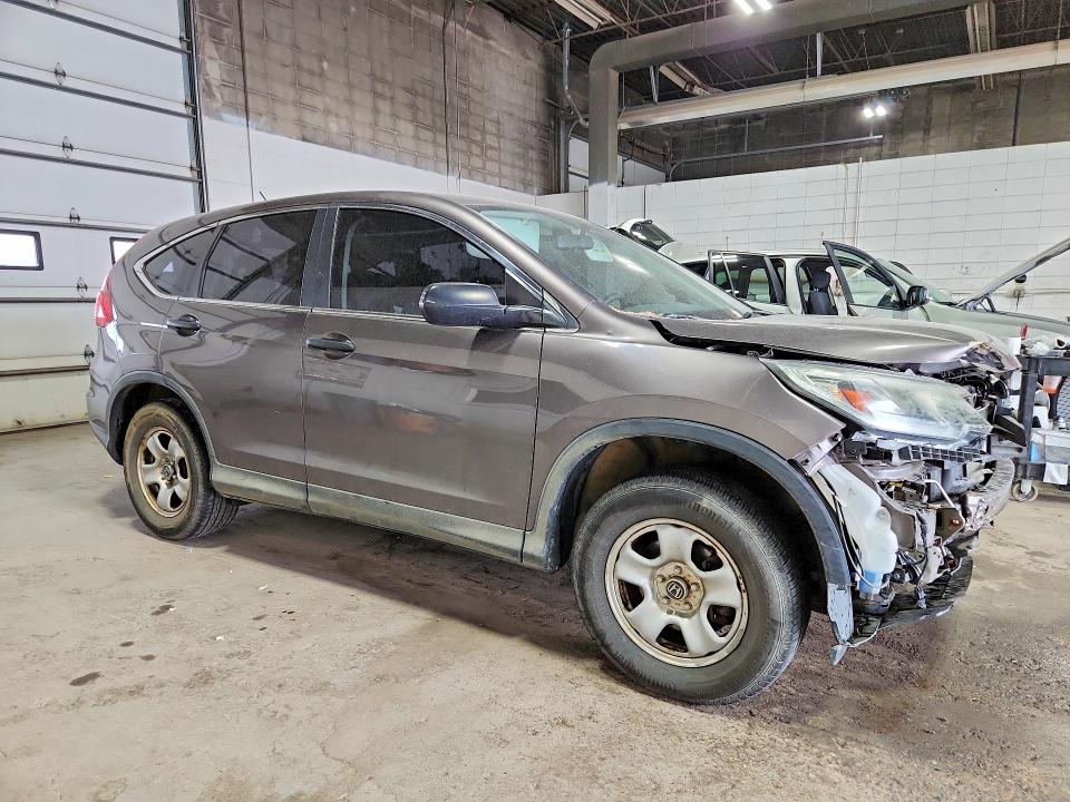 Photo 4 from auction – 2015 HONDA CR-V with VIN 2HKRM4H37FH604237