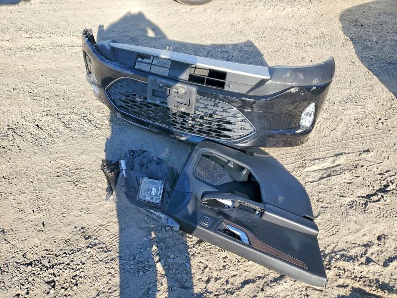 Photo 12 from auction – 2020 FORD ESCAPE with VIN 1FMCU9J95LUC77447