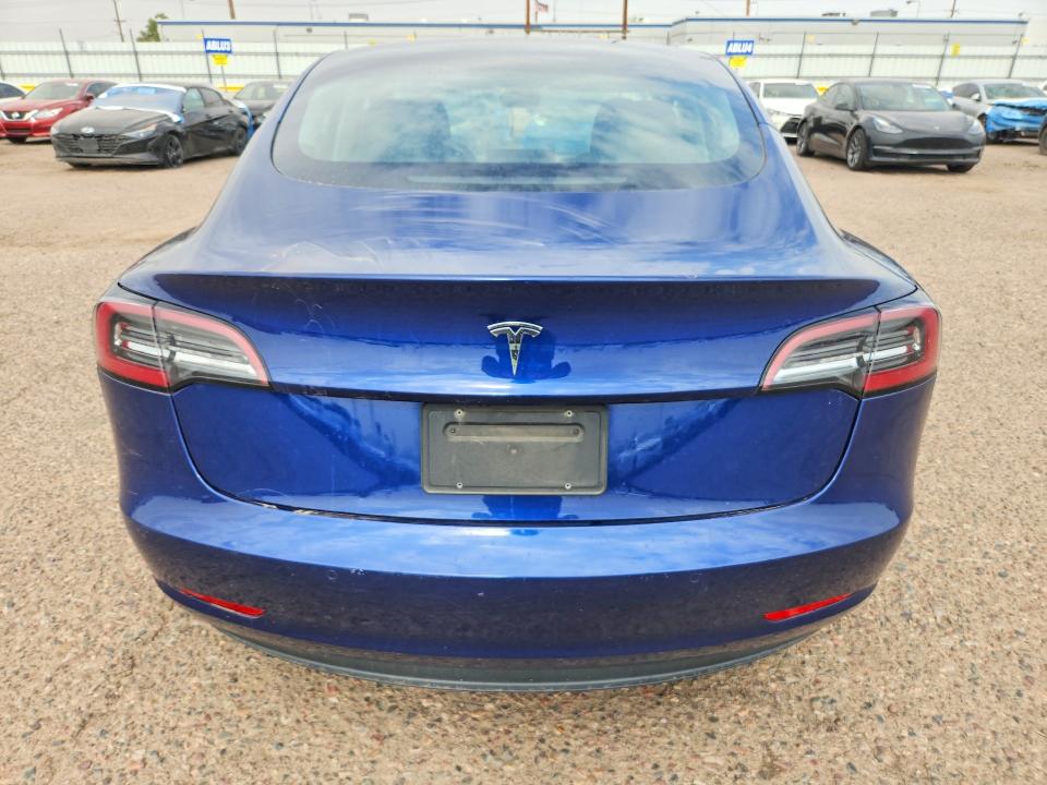 Photo 6 from auction – 2022 TESLA MODEL 3 with VIN 5YJ3E1EA2NF304347