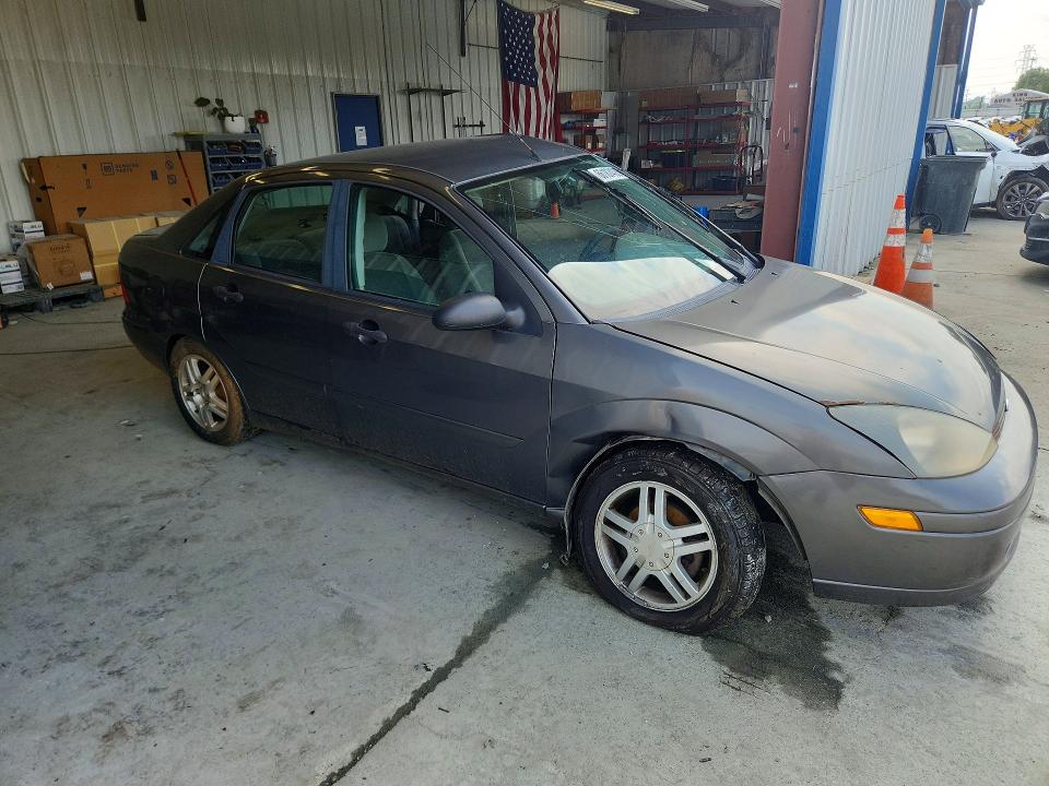 Photo 4 from auction – 2003 FORD FOCUS with VIN 1FAFP34313W326019