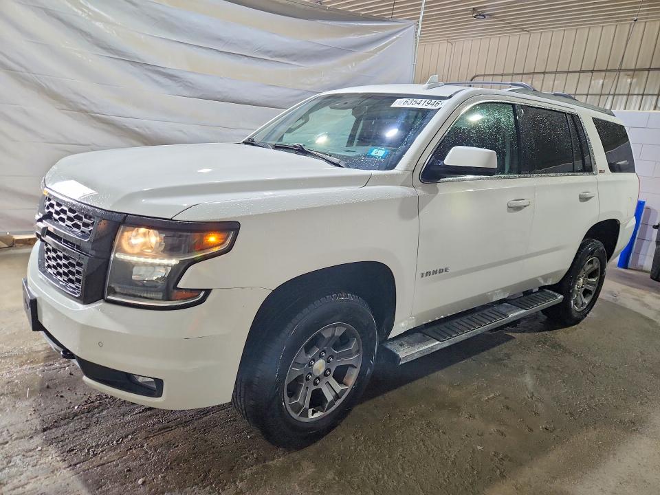 CHEVROLET TAHOE 2015 with VIN 1GNSKBKC7FR592644 - Photo from auction