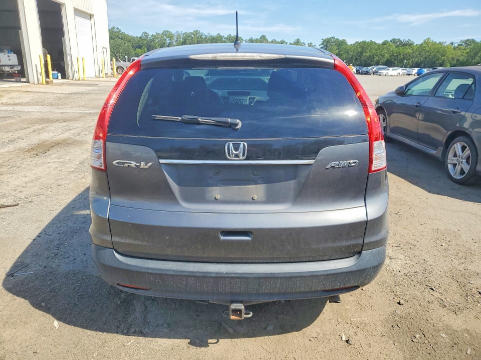 Photo 6 from auction – 2013 HONDA CR-V with VIN 2HKRM4H50DH604451