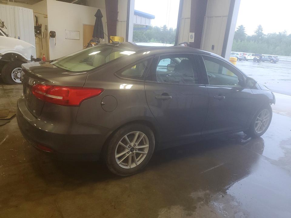Photo 3 from auction – 2015 FORD FOCUS with VIN 1FADP3F23FL226540