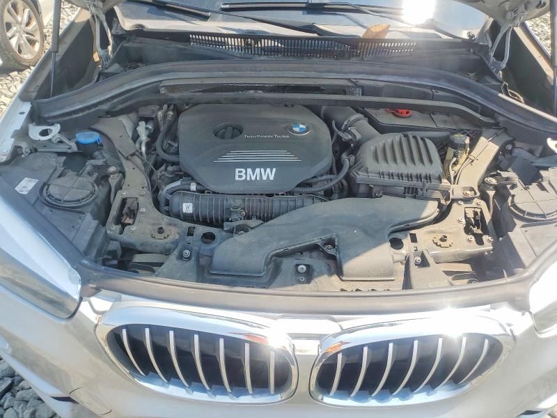Photo 11 from auction – 2017 BMW X1 with VIN WBXHT3C36H5F70042