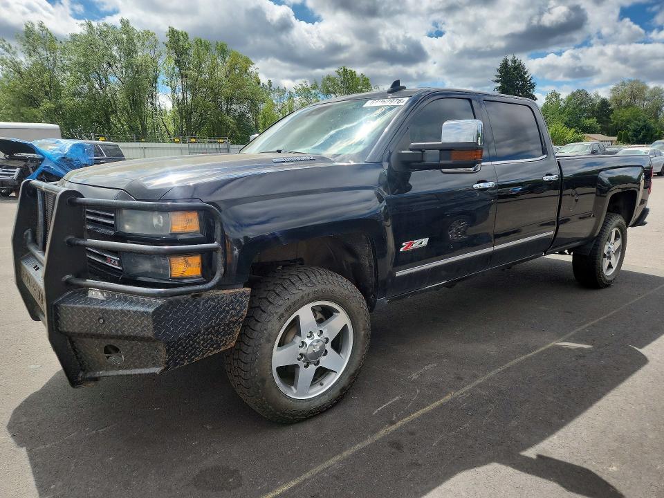 CHEVROLET SILVERADO 2015 with VIN 1GC1KWE80FF644751 - Photo from auction