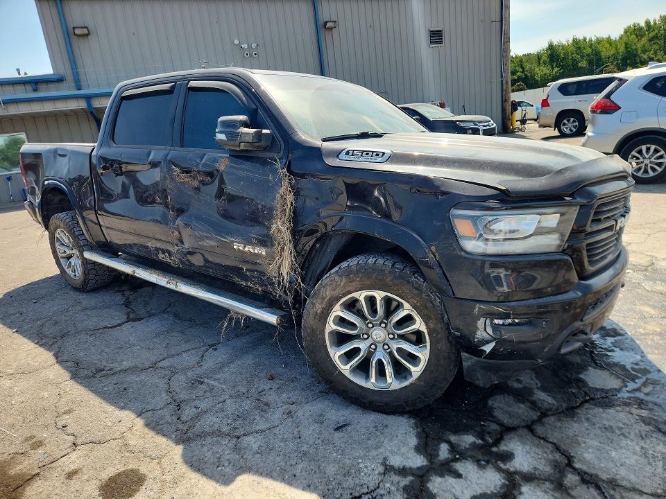 Photo 4 from auction – 2021 RAM 1500 with VIN 1C6SRFJT7MN660191