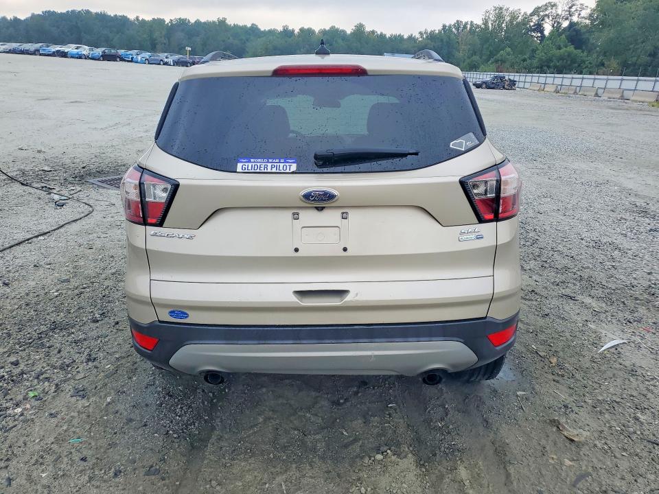 Photo 6 from auction – 2018 FORD ESCAPE with VIN 1FMCU9HD8JUA94048