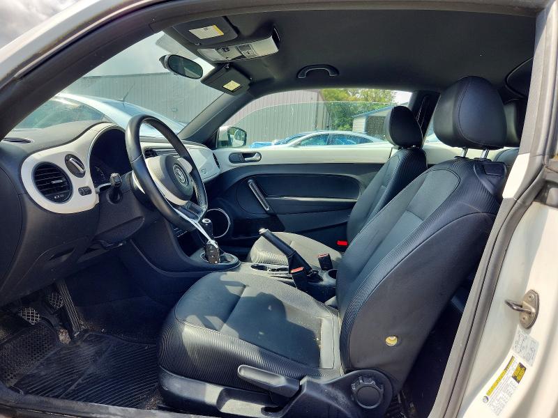 Photo 7 from auction – 2012 VOLKSWAGEN BEETLE with VIN 3VWHP7AT5CM622575