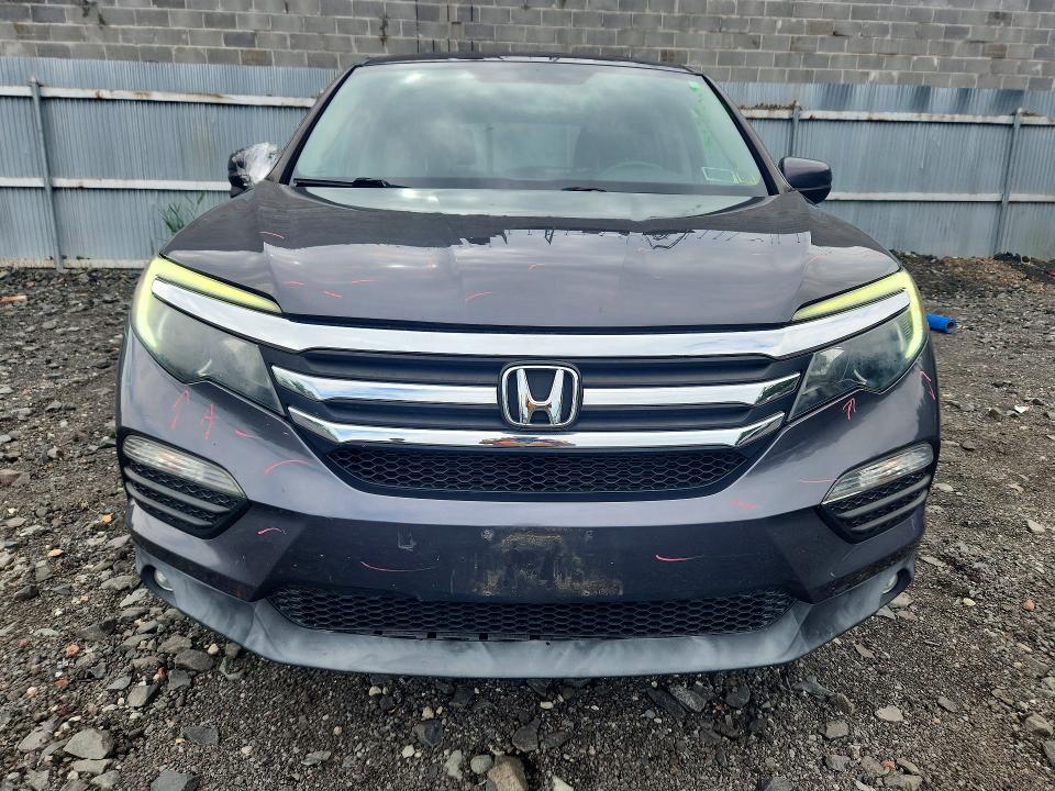 Photo 5 from auction – 2018 HONDA PILOT with VIN 5FNYF6H51JB017736