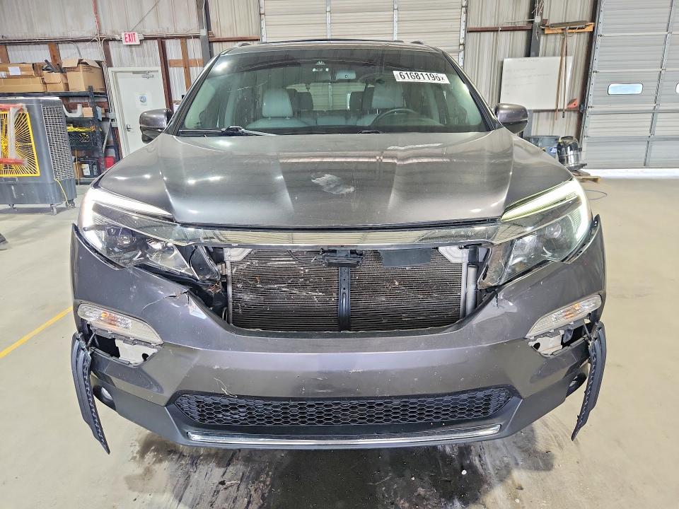 Photo 5 from auction – 2017 HONDA PILOT with VIN 5FNYF6H9XHB104435