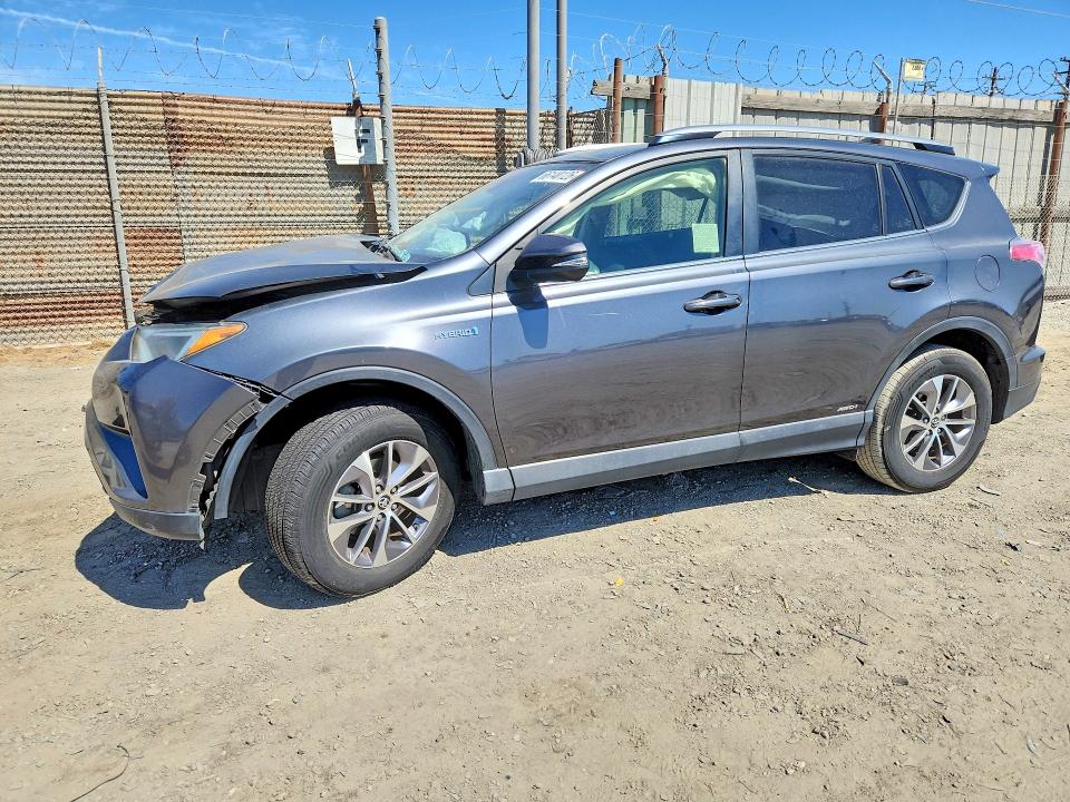 TOYOTA RAV4 HYBRID 2018 с VIN JTMRJREV6JD222131 - Снимка от търг