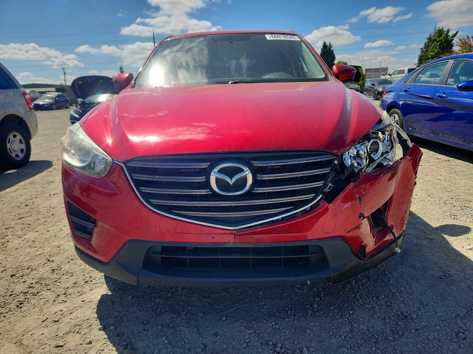 Photo 5 from auction – 2016 MAZDA CX-5 with VIN JM3KE4BYXG0734490