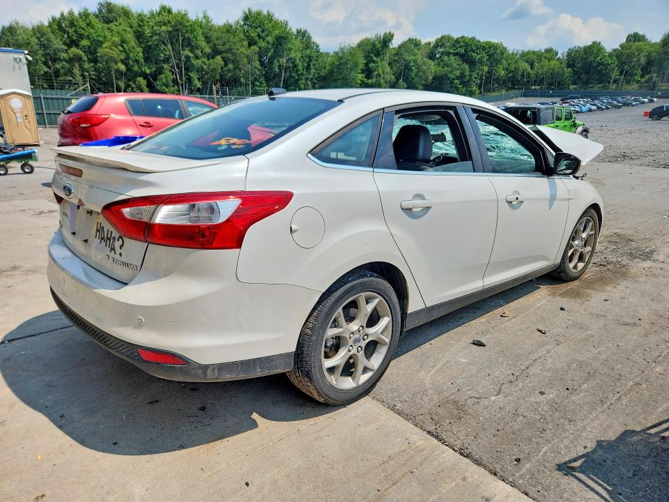 Снимка 3 от търг – 2013 FORD FOCUS с VIN 1FADP3J26DL155161